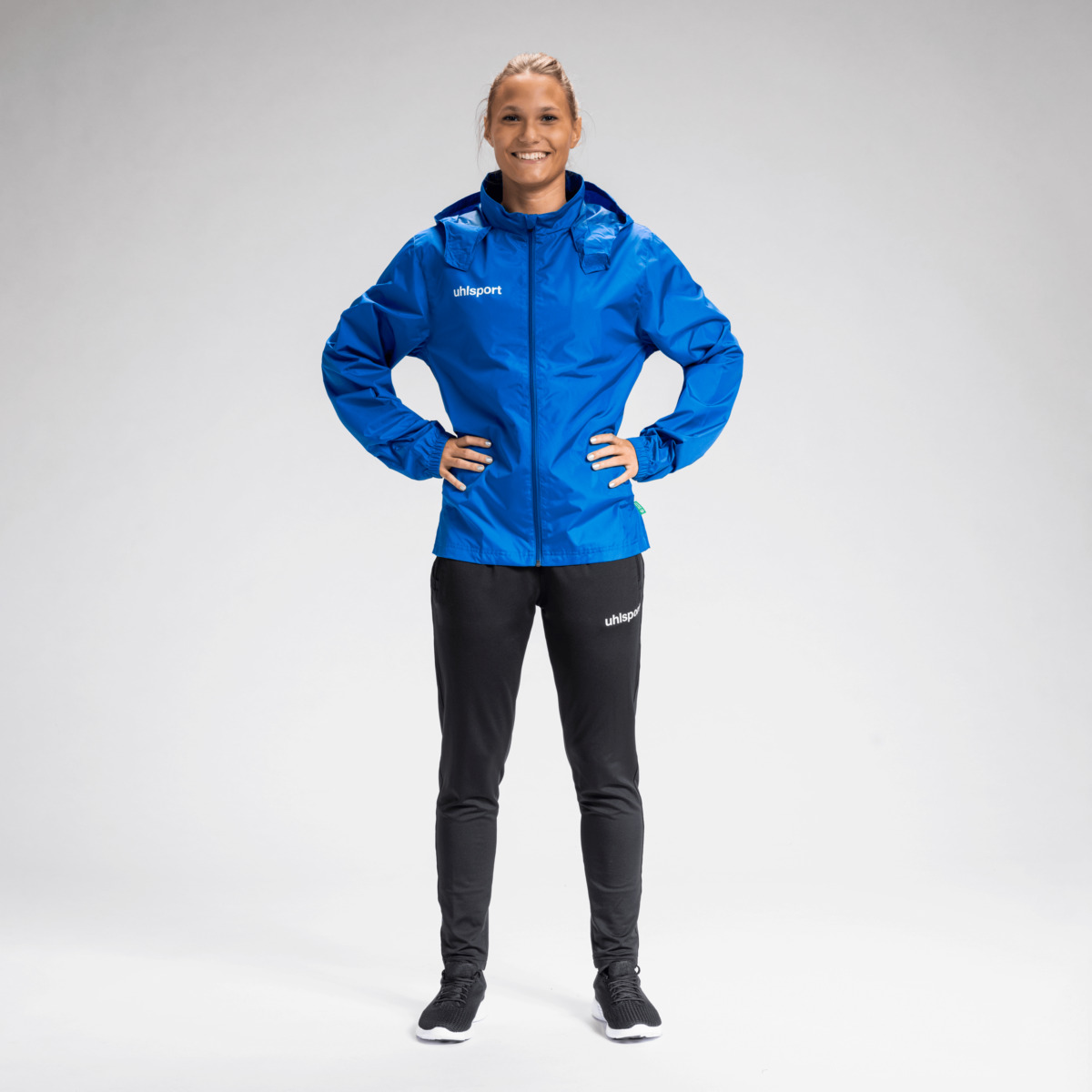 Essential All weather jacket in azure blue in the official uhlsport store